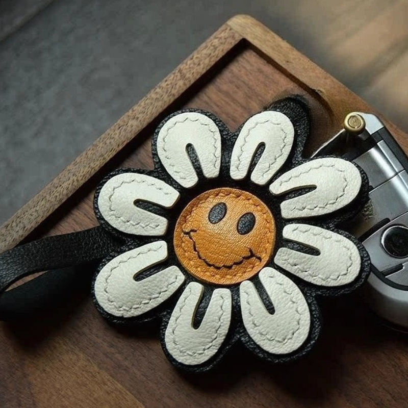 Porte-clés fleur visage joyeux - Phone Accessories Ideas avis et prix